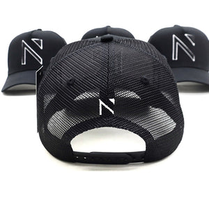 The All Black with white outline Signature 'N' Mesh Trucker Cap