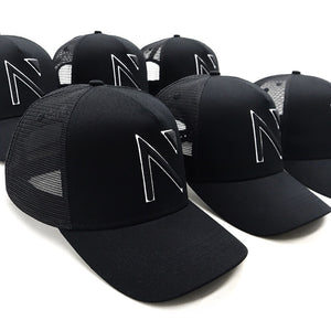 The All Black with white outline Signature 'N' Mesh Trucker Cap