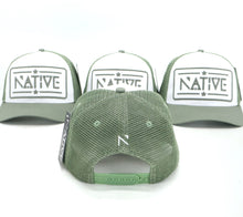 The Green and white two tone Native Shield