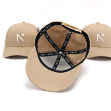 The Beige and White Signature ‘N’ Baseball Cap