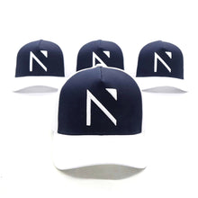 The White and Navy Signature ‘N’ Trucker Cap