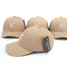 The Beige and White Signature ‘N’ Baseball Cap