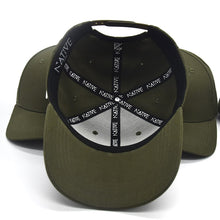 The khaki and White Signature ‘N’ Baseball Cap