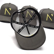 The Grey and Yellow Signature 'N' Mesh Trucker Cap