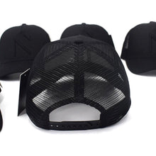 The All Black Signature 'N' Mesh Trucker Cap